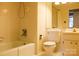 Cozy bathroom featuring a shower-tub combination, toilet, vanity and lighting at 153 Perrin Pl, Charlotte, NC 28207