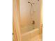 Bathroom with a white tub and shower, showcasing a clean and functional space at 153 Perrin Pl, Charlotte, NC 28207