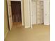 Carpeted bedroom featuring a closet with built-in shelving, enhancing storage and organization at 153 Perrin Pl, Charlotte, NC 28207