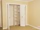Bedroom closet with adjustable shelves and built-in storage solutions at 153 Perrin Pl, Charlotte, NC 28207