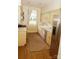Functional kitchen with stainless steel appliances, wood cabinets, and ample counter space at 153 Perrin Pl, Charlotte, NC 28207