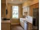 Kitchen with stainless steel appliances and lots of wooden cabinets at 153 Perrin Pl, Charlotte, NC 28207