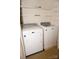 Laundry room featuring a washer and dryer with shelving at 153 Perrin Pl, Charlotte, NC 28207