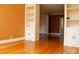 Bright room with built in shelving and hardwood floors at 153 Perrin Pl, Charlotte, NC 28207