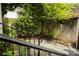 Charming outdoor area featuring stonework and lush greenery, creating a peaceful garden retreat at 153 Perrin Pl, Charlotte, NC 28207