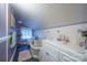 Cozy bathroom featuring a clawfoot tub, tile accents, and painted purple walls at 153 S Center St, Taylorsville, NC 28681