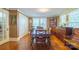 Dining room featuring hardwood floors, closet, and plenty of natural light at 153 S Center St, Taylorsville, NC 28681