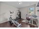 Bedroom with exercise equipment, desk, chair, and window with natural light at 1569 Shannon Falls Dr, Fort Mill, SC 29715