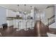 Bright eat-in kitchen features a breakfast bar, stainless appliances and white cabinets at 1569 Shannon Falls Dr, Fort Mill, SC 29715