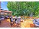 Back deck with dining area and comfortable seating, perfect for outdoor entertaining at 15811 Burlingame Dr, Huntersville, NC 28078