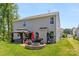 Wide backyard featuring a gazebo, outdoor grill, patio area, and a fire pit for entertaining at 2439 Judson Dr, Gastonia, NC 28054