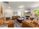 Inviting living room with comfortable seating, a modern fireplace, and natural light from the window at 2439 Judson Dr, Gastonia, NC 28054