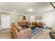 Spacious living room with neutral walls, comfortable seating, an area rug, and natural light at 2439 Judson Dr, Gastonia, NC 28054