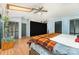 Comfortable bedroom featuring hardwood floors, skylight, and two closets for extra storage at 300 S Hudson Ave, Spencer, NC 28159