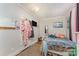 Cozy bedroom featuring a white bed frame and light gray walls, creating a restful retreat at 300 S Hudson Ave, Spencer, NC 28159