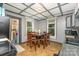 Dining area featuring table, chairs, and natural light at 300 S Hudson Ave, Spencer, NC 28159