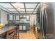 Cozy kitchen with tile backsplash and stainless steel refrigerator at 300 S Hudson Ave, Spencer, NC 28159