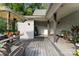 Covered porch with furniture, plants and outdoor decor, perfect for relaxing at 300 S Hudson Ave, Spencer, NC 28159