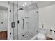 Modern bathroom featuring marble-tiled shower, sleek fixtures and a spacious layout at 316 Wade Hampton Dr, Matthews, NC 28104