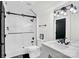 Modern bathroom featuring subway tile, glass enclosed shower, and elegant vanity with a vessel sink at 316 Wade Hampton Dr, Matthews, NC 28104