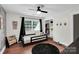 Charming bedroom with wood floors, a built-in closet, and a cozy reading nook at 316 Wade Hampton Dr, Matthews, NC 28104