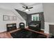 Stylish bedroom with star wallpaper, a ceiling fan, and dark wood floors at 316 Wade Hampton Dr, Matthews, NC 28104
