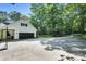Spacious garage with a basketball hoop and ample parking at 316 Wade Hampton Dr, Matthews, NC 28104