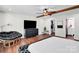 Bright main bedroom with hardwood floors, exposed beam, large window, and chic decor at 316 Wade Hampton Dr, Matthews, NC 28104