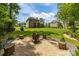 Spacious backyard featuring a cozy fire pit area and well-maintained lawn at 322 Ethan Ln, Rock Hill, SC 29732