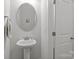 Clean bathroom featuring a pedestal sink, modern fixtures, and a shower-tub combination at 322 Ethan Ln, Rock Hill, SC 29732