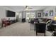 Bright living room with large windows, plush seating, and modern decor at 322 Ethan Ln, Rock Hill, SC 29732