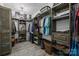 Spacious walk-in closet with custom shelving, drawers, and hanging rods for organized storage at 322 Ethan Ln, Rock Hill, SC 29732