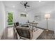 Inviting bedroom with natural light, comfortable seating, and a minimalist design at 3304 Mar Vista Cir, Charlotte, NC 28209