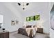 Bright main bedroom with vaulted ceilings, unique window, and neutral decor at 3304 Mar Vista Cir, Charlotte, NC 28209