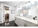 Bathroom featuring black hexagon floor tiles and a double sink vanity at 3741 9Th Street Ne Ct, Hickory, NC 28601