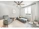 Bedroom with gray wood-look floors, a car bed, and white window curtains at 3741 9Th Street Ne Ct, Hickory, NC 28601