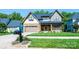 Beautiful two-story home showcasing stone accents, manicured lawn and an attached two car garage at 3741 9Th Street Ne Ct, Hickory, NC 28601