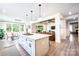 Spacious kitchen with large island, stainless appliances, and adjacent dining area, perfect for entertaining at 3741 9Th Street Ne Ct, Hickory, NC 28601