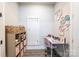Bright playroom with storage bins, a desk and a chair, and a small door at 3741 9Th Street Ne Ct, Hickory, NC 28601