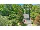 Beautiful aerial view of a two-story home surrounded by lush greenery and mature trees at 4000 Garfield Ct, Waxhaw, NC 28173
