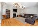 Spacious living room with a fireplace, modern ceiling fans, and a comfortable seating area at 4000 Garfield Ct, Waxhaw, NC 28173
