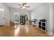 Bright office area with hardwood floors, neutral walls, lots of windows, and modern decor at 4000 Garfield Ct, Waxhaw, NC 28173