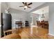 A versatile space with a ceiling fan, hardwood floors, and natural light at 4000 Garfield Ct, Waxhaw, NC 28173