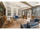 Cozy, brick-floored screened porch with comfortable seating and plenty of natural light at 4000 Garfield Ct, Waxhaw, NC 28173