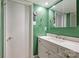Bright bathroom featuring a vanity, mirror, and well-lit space at 4736 Hedgemore Dr, Charlotte, NC 28209