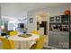 Bright dining area with views into the living room and kitchen at 4736 Hedgemore Dr, Charlotte, NC 28209