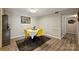 Bright dining area with four chairs and wood-look flooring at 4736 Hedgemore Dr, Charlotte, NC 28209