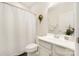 Neutral bathroom with a shower featuring white tiling and fixtures at 5008 Patton Dr, Gastonia, NC 28056