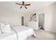 Spacious main bedroom includes a large bed, dresser, and ensuite bathroom access at 5008 Patton Dr, Gastonia, NC 28056