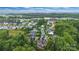 Aerial view of a neighborhood featuring lush green trees and well-maintained homes at 501 Preservation Dr, Fort Mill, SC 29715